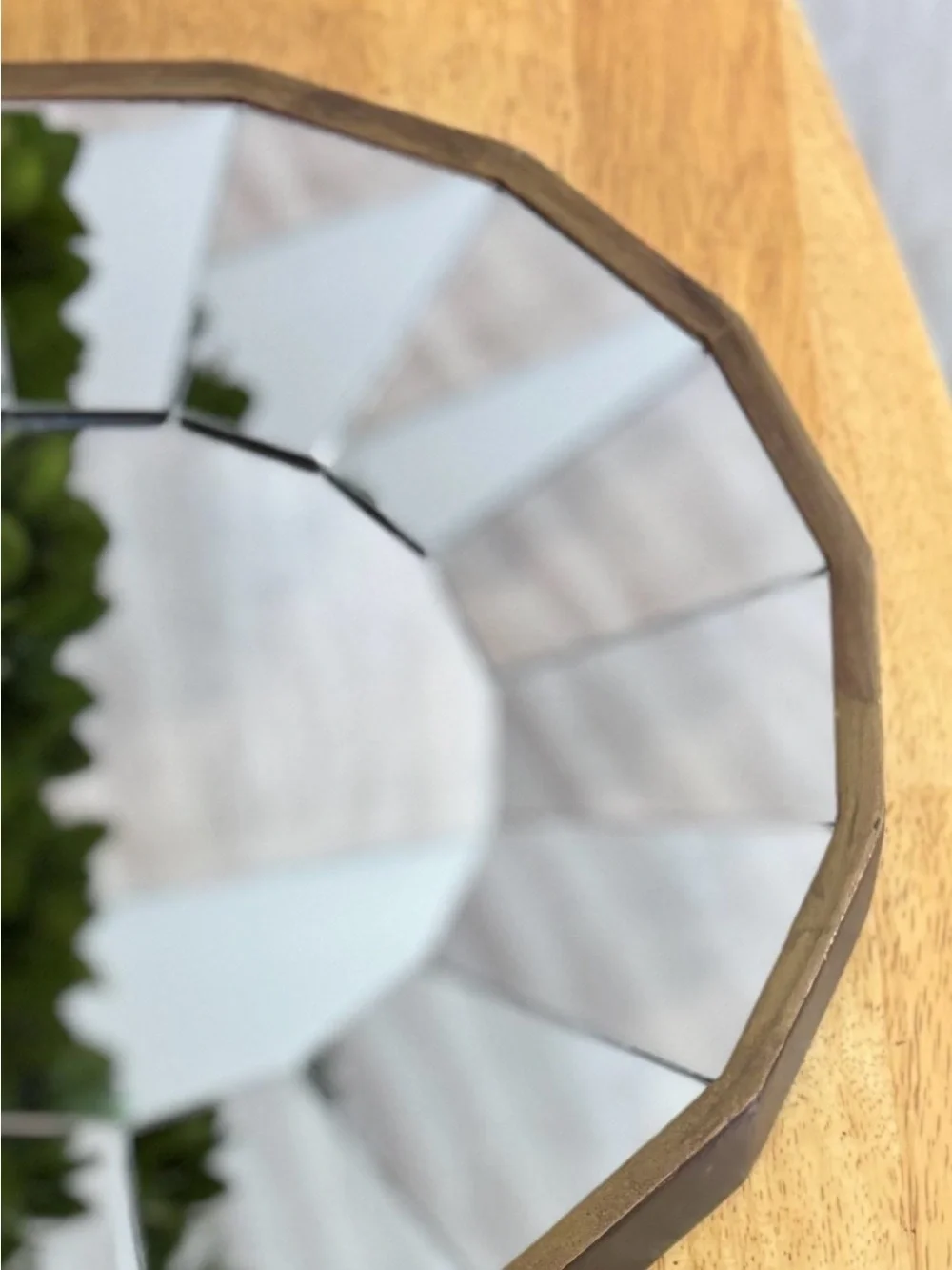 Modern Segmented Round Wall Mirror with Elegant Gold and Brown Tone Frame